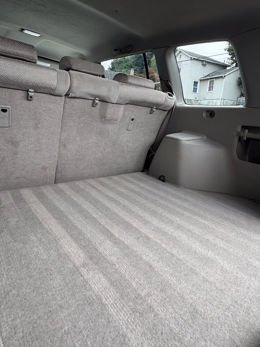 Spotless, vacuumed cargo area after a full interior detail