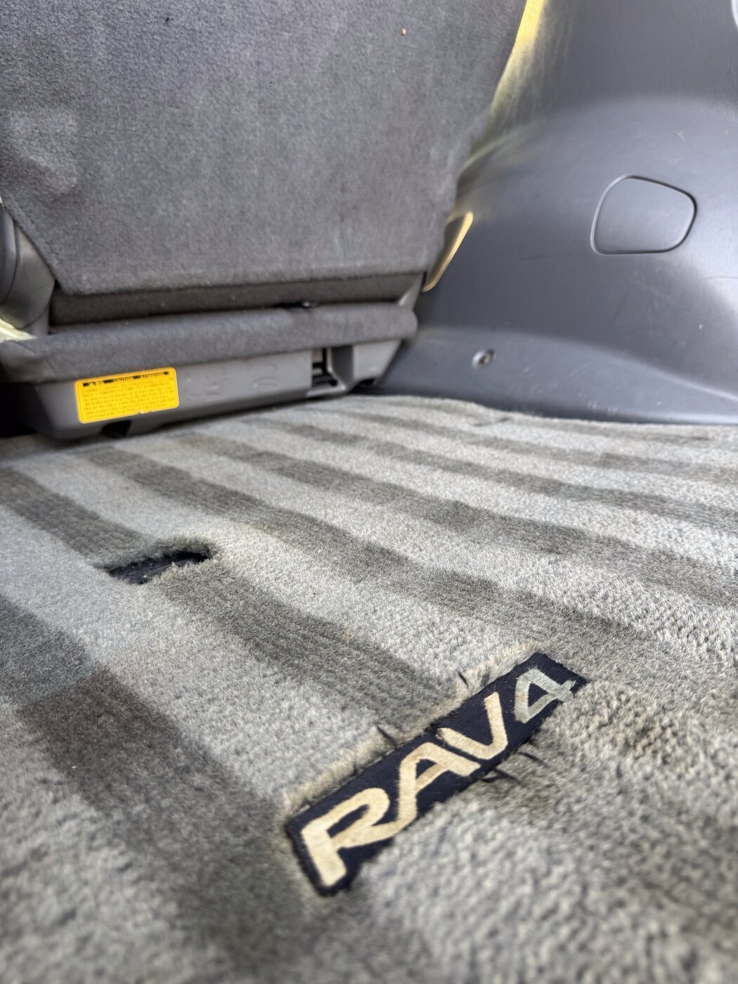 Freshly vacuumed trunk with crisp, clean vacuum lines